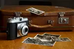 Which is better, scan your own photos or use a photo scanning service? Helpful guide .Advantages + disadvantages of scanning yourself or having it done for you.