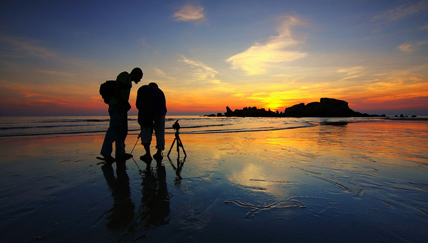 2 tripods at sunset