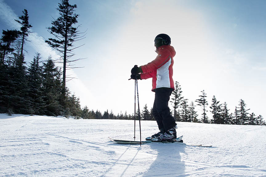 Back-lit skier