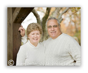 Look for existing backgrounds or other objects that you can use to frame the family pose