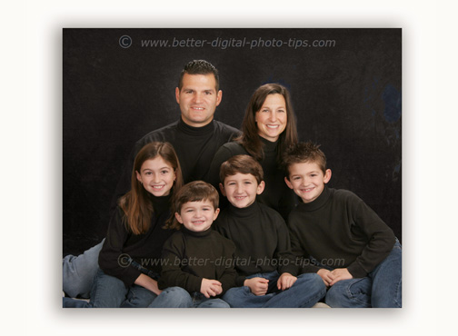 Family portrait of 6 posed people