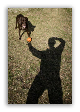 Self portrait with dog and ball - using the rule of thirds