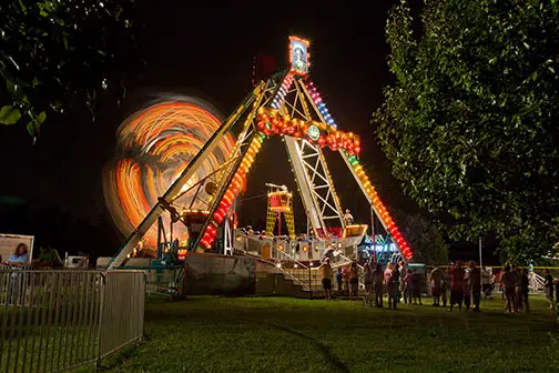 Using a tripod at a carnival gave me a combination of blurred parts and sharp parts of the scene.<br><br>