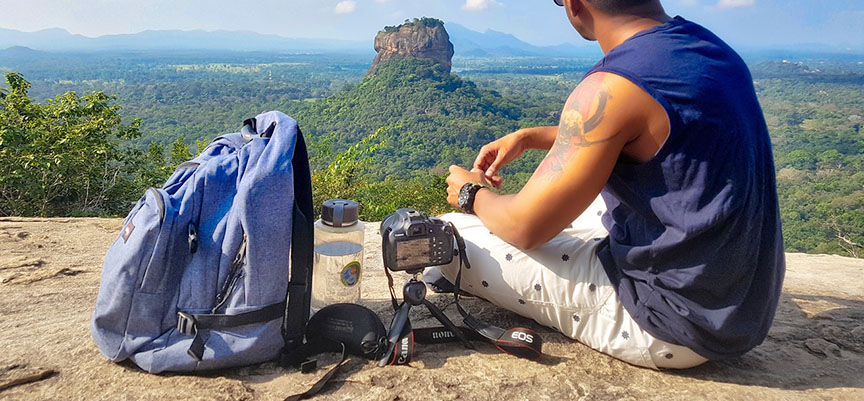 Hiker with camera backpack