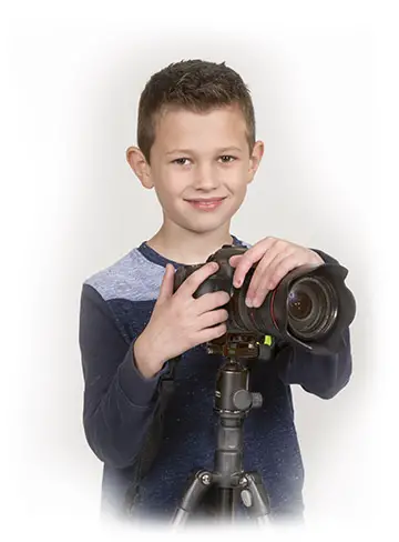 boy with DSLR camera