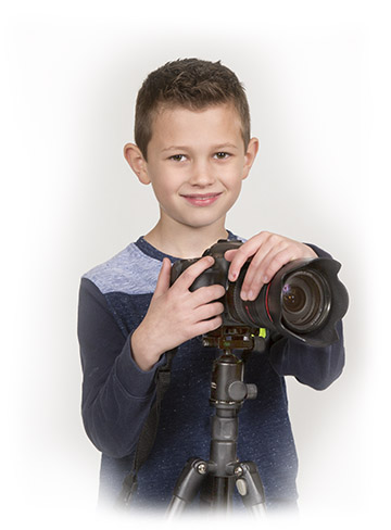 boy with DSLR camera