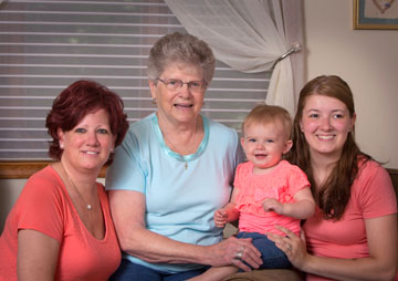 family pose of 4 people