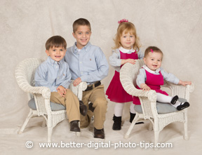 Pose of four young children