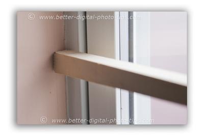 Lean the stick on a solid object