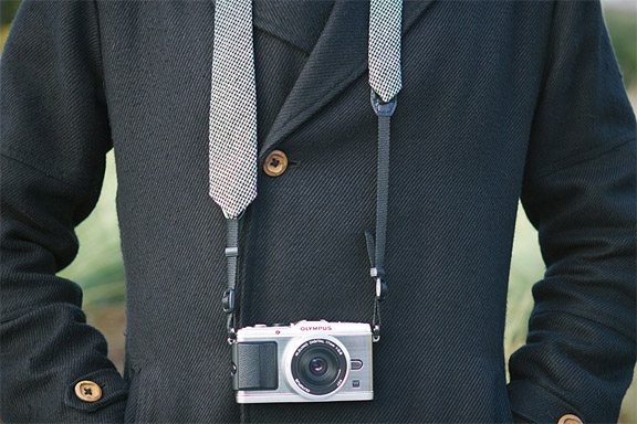 camera support with fashion necktie and camera strap