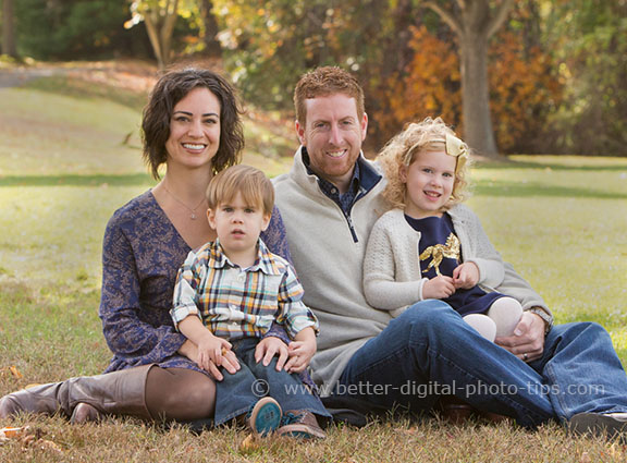 Pose for 2 young children and parents.