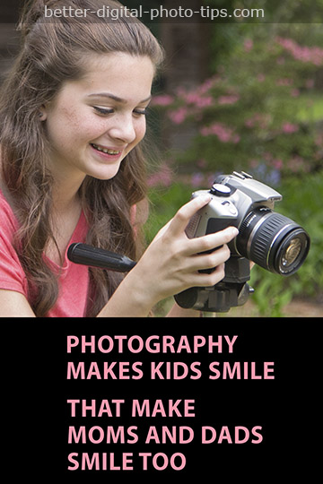 Smiling child photographer