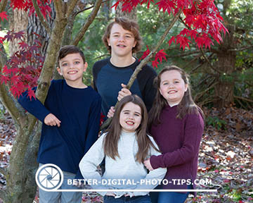 Posed outdoor family portrait of kids