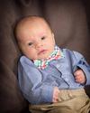 Baby Posed in Corner of Couch